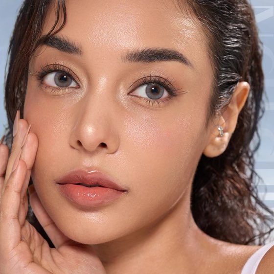 Model wearing Fancylens colored contacts for dark eyes