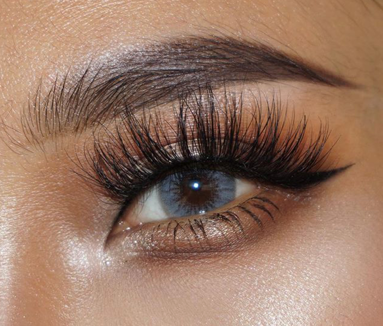 Pitchy Solotica Gray monthly colored contacts enhance dark eyes with an ash-gray tone and soft glow for a luminous, natural look. Powers 0.00 to -10.00.