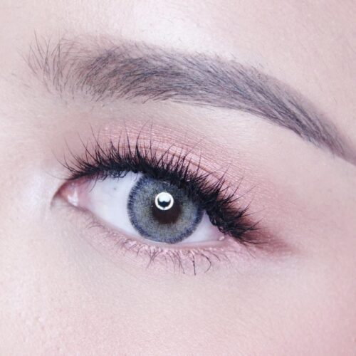 Dreamcolor Nobluk Gray monthly colored contacts enhance dark eyes with a gray shade and doll-eye effect for a fresh look. Available in powers 0.00 to -10.00.