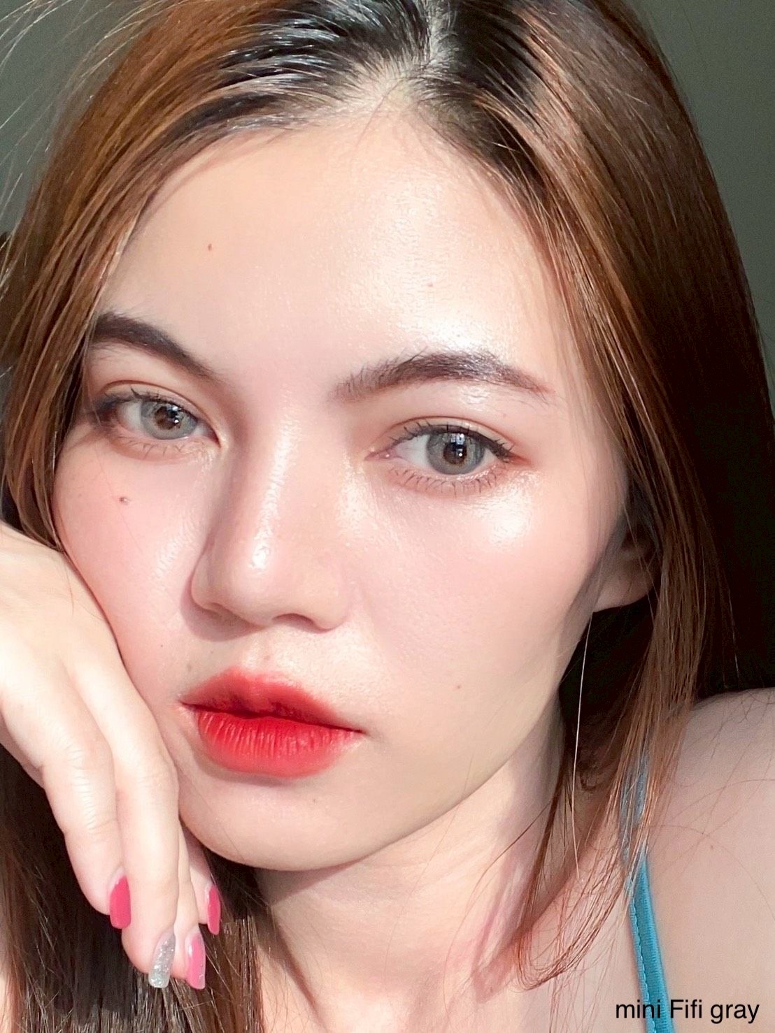 Kitty Kawaii Fifi Gray monthly colored contacts enhance dark eyes with a soft limbal ring and natural gray blend for a realistic look. Powers 0.00 to -10.00.