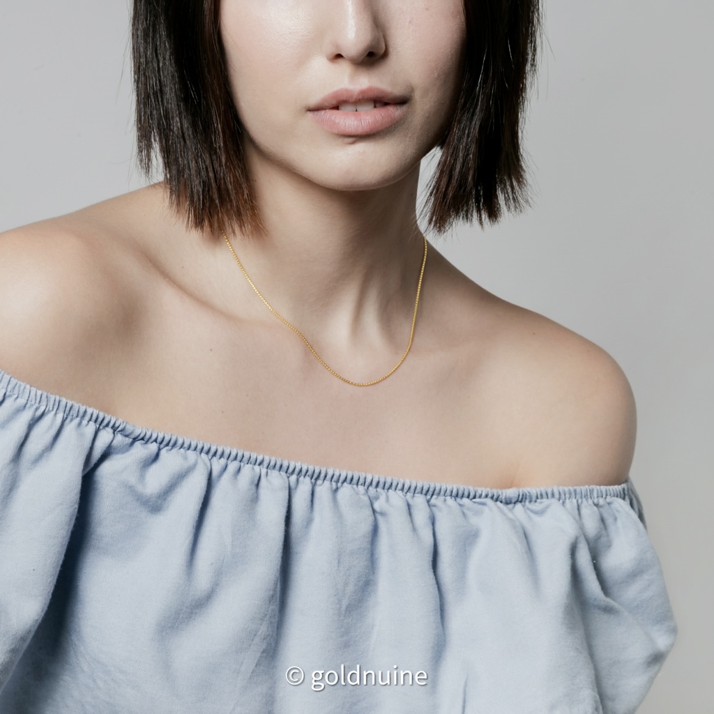 9K solid gold twisted box chain necklace in yellow or white gold. A sleek, polished, light-catching chain that adds timeless elegance to everyday style.