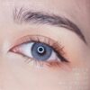 Dreamcolor Samui Gray monthly colored contacts. Cool gray with dark limbal ring and intricate pattern. Natural blend for dark eyes with defined look. Powers 0.00 to -10.00.