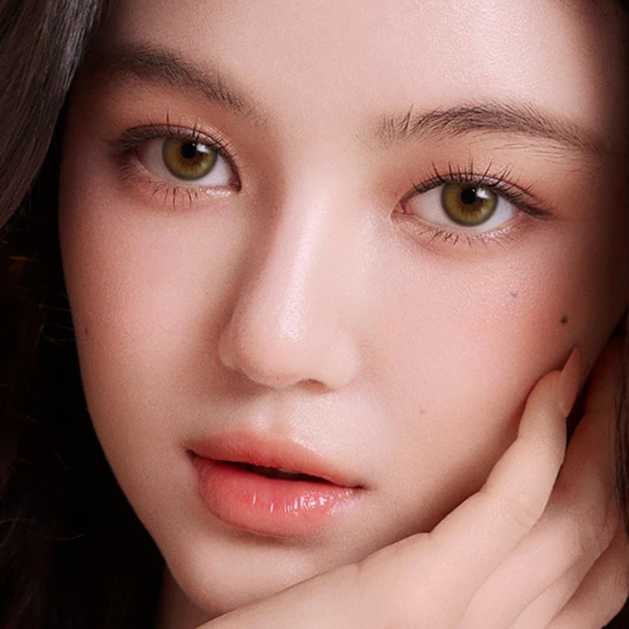 Enhance dark eyes with OLENS Scandi Olive monthly colored contacts. Natural olive tone, soft blend, no harsh ring. Korean FDA-approved. Powers 0.00 to -8.00.