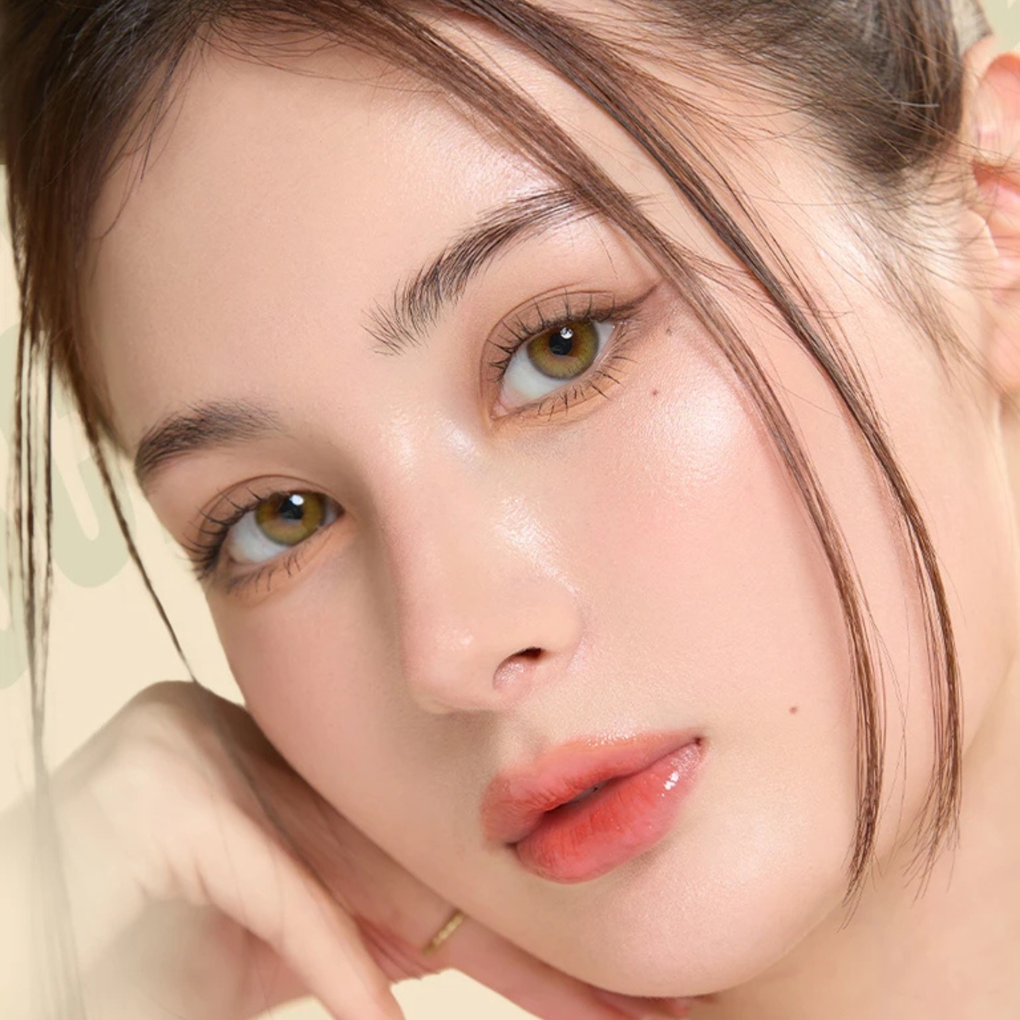 Enhance dark eyes with OLENS Scandi Olive monthly colored contacts. Natural olive tone, soft blend, no harsh ring. Korean FDA-approved. Powers 0.00 to -8.00.