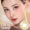 OLENS French Shine Hazel monthly colored contacts. Warm hazel tone with soft shine, natural blend, no harsh ring. Available 0.00 to -8.00, including plano.