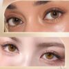 OLENS French Shine Hazel monthly colored contacts. Warm hazel tone with soft shine, natural blend, no harsh ring. Available 0.00 to -8.00, including plano.
