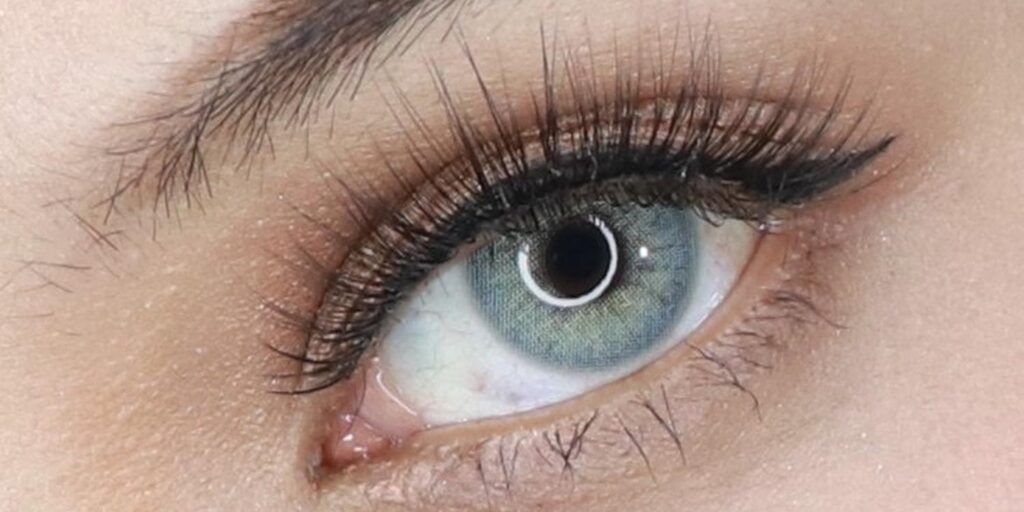 Pitchy Gray monthly colored contacts for dark eyes provide full coverage with balanced definition to create a cool gray finish. The layered design adds depth. 0.00 to -10.00.