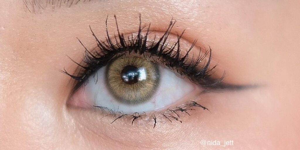 Brown with a cool gray edge — Glitzlens Lolite Brown Monthly Colored Contacts for dark eyes give eyes a soft, natural depth with a shaded rim for a polished, everyday look. Powers 0.00 to -10.00.
