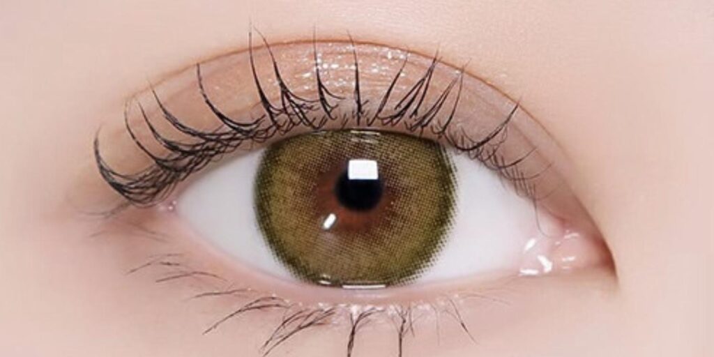 Canna Roze Olive Green Colored Contacts for Dark Eyes provide subtle green tone with soft blend and natural coverage. Unique everyday look. Available in powers 0.00 to -10.00.
