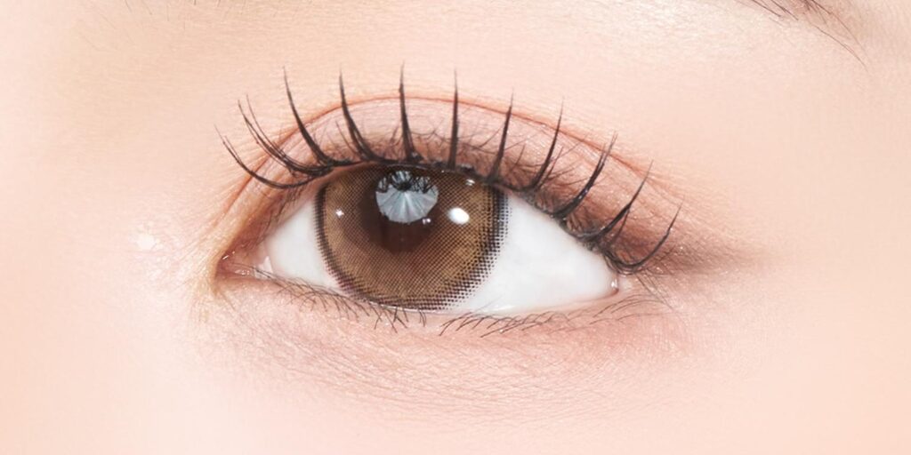 Sisse Lili Butter Beige colored contacts on dark eyes showing buttery warm beige with soft-matte finish for ultra-natural everyday look