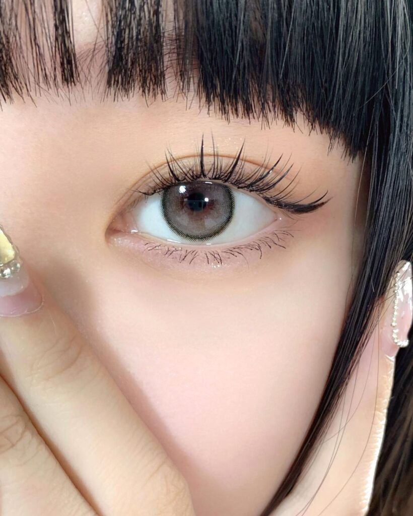 Uria Earl Gray Colored Contacts for Dark Eyes provide soft gray tone with smooth coverage and subtle depth. Natural everyday look. Available in powers 0.00 to -10.00.