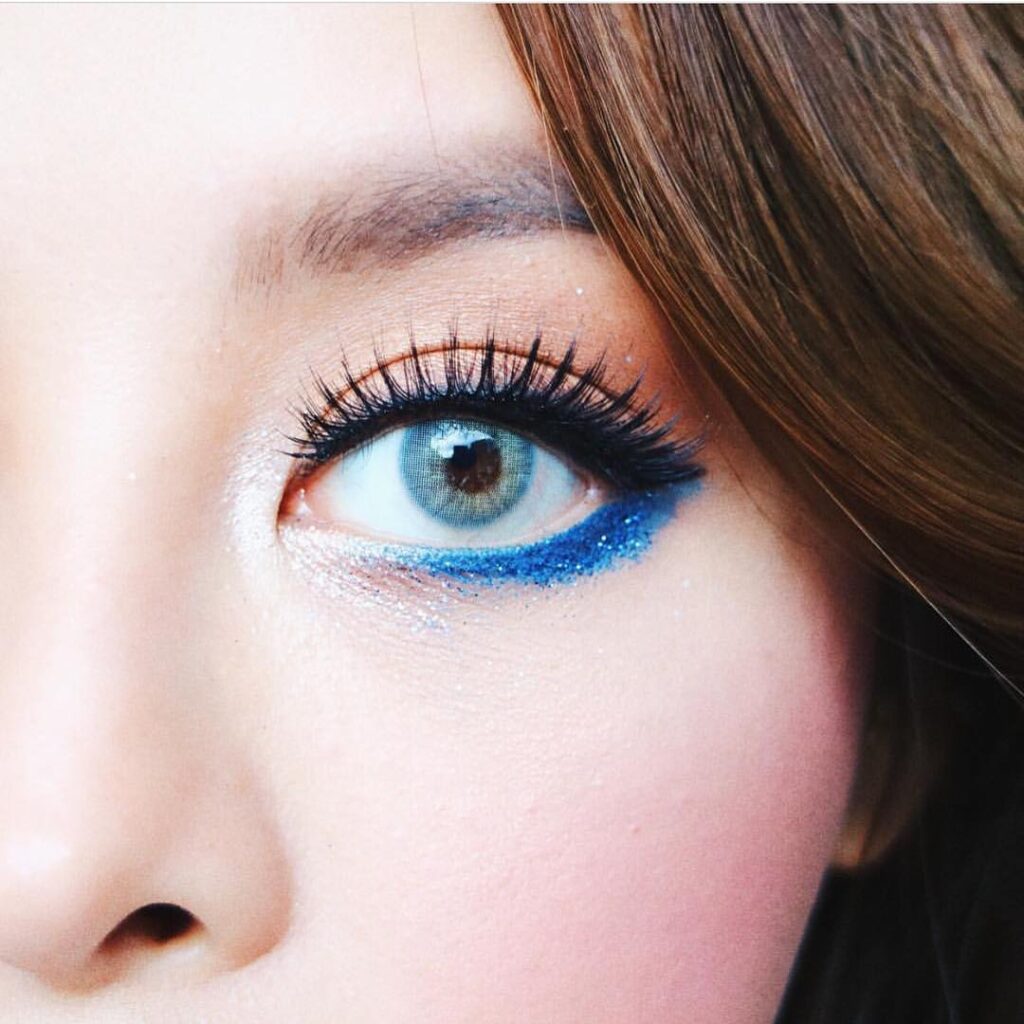 Kitty Kawaii Ava Blue colored contacts for dark eyes deliver a dolly effect with a soft blue tone that enlarges your eyes with a smooth transition. 0.00 to -10.00.