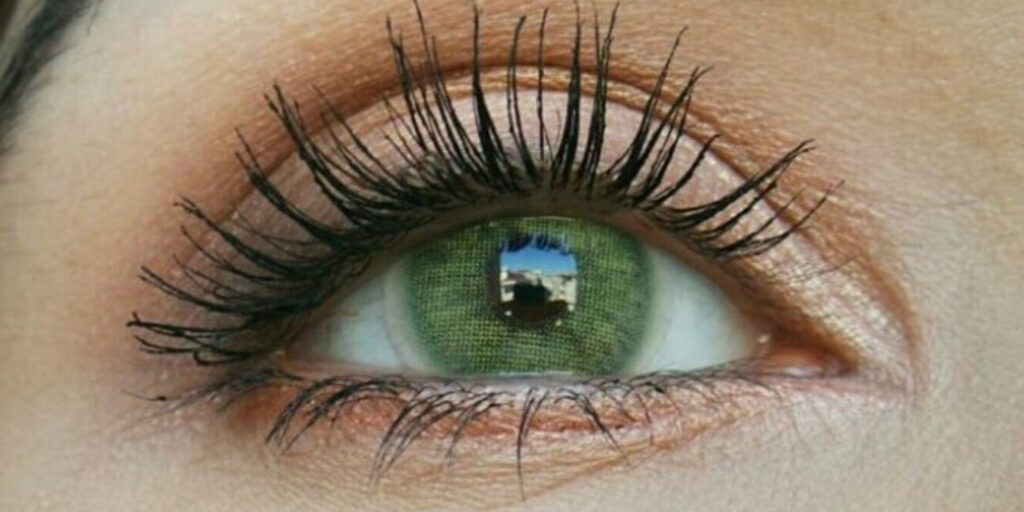 Pitchy Green monthly colored contacts enhance dark eyes with vivid green tones and full coverage for a fresh, natural look. Available in powers 0.00 to -10.00.